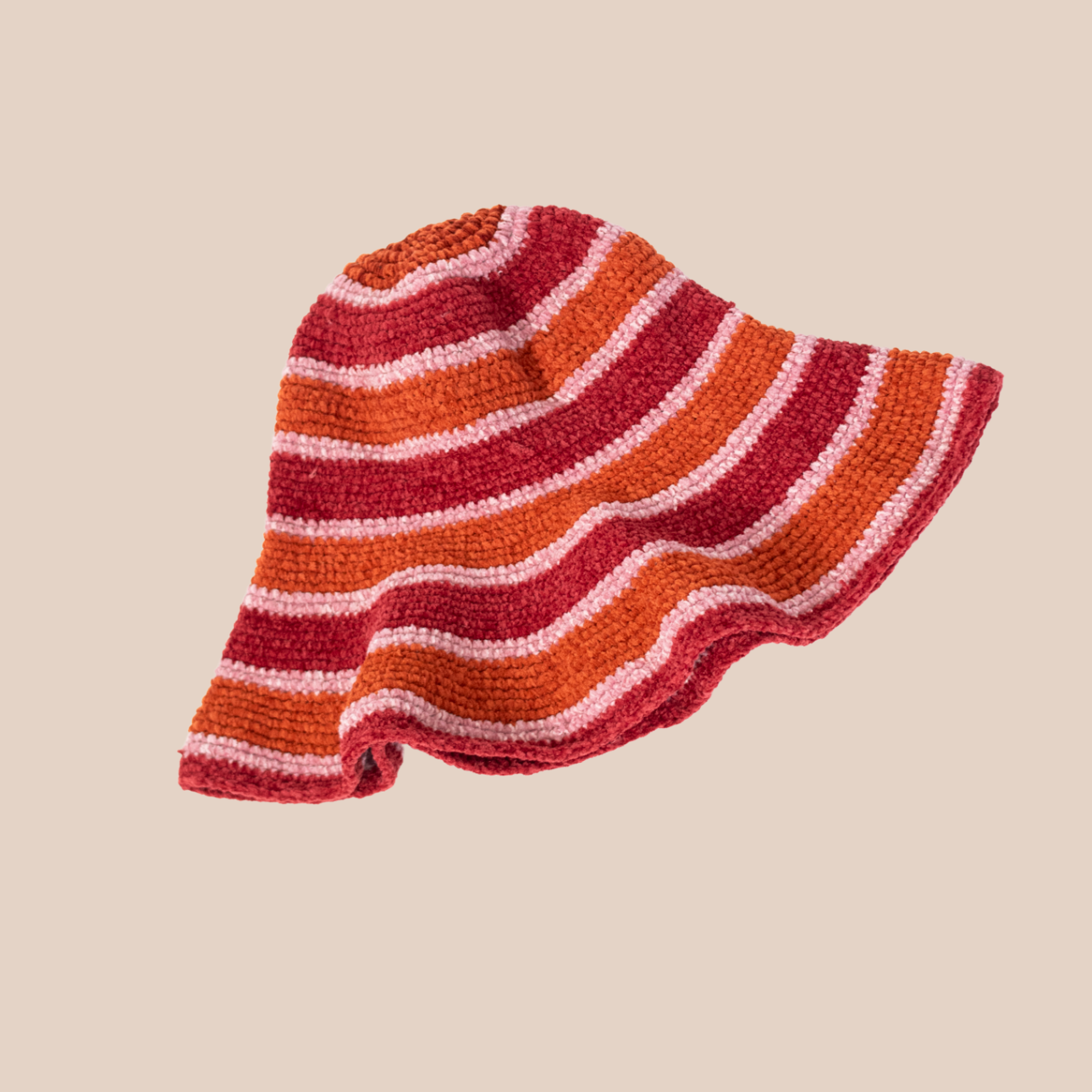 Handmade wide-brim chenille (cotton silk) crochet hat with striped patterns in shades of orange.