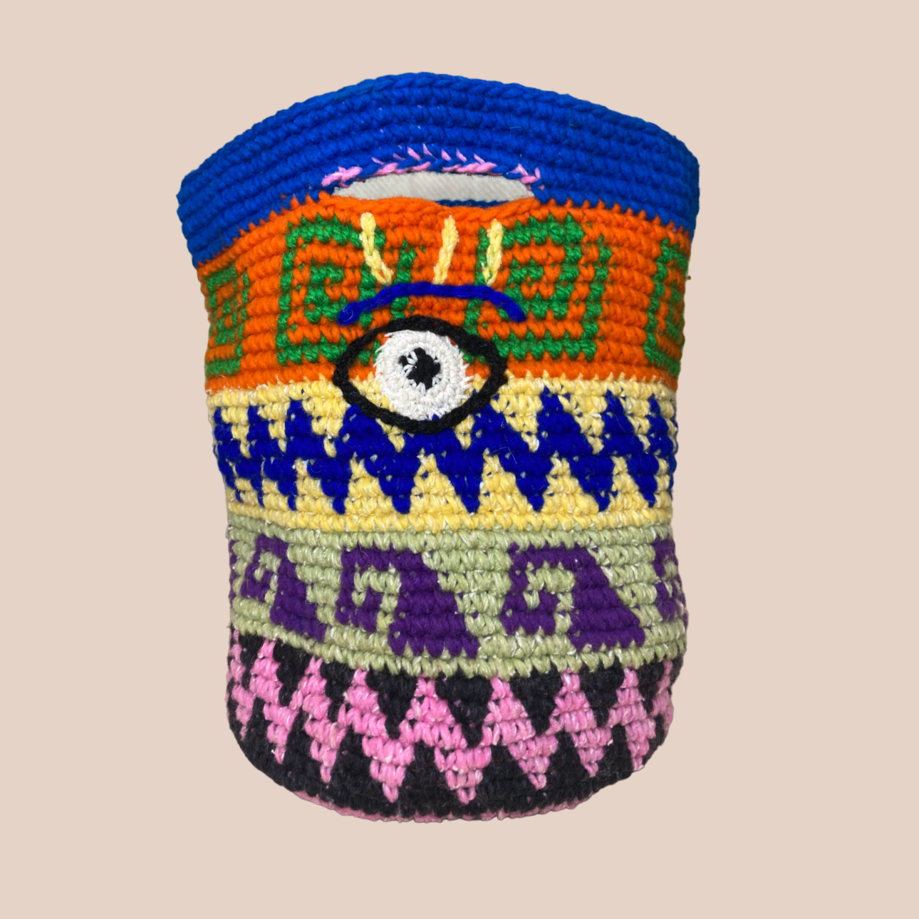  Image du sac motifs oeil de Maison Badigo, sac en laine crocheté multicolore unique et tendance