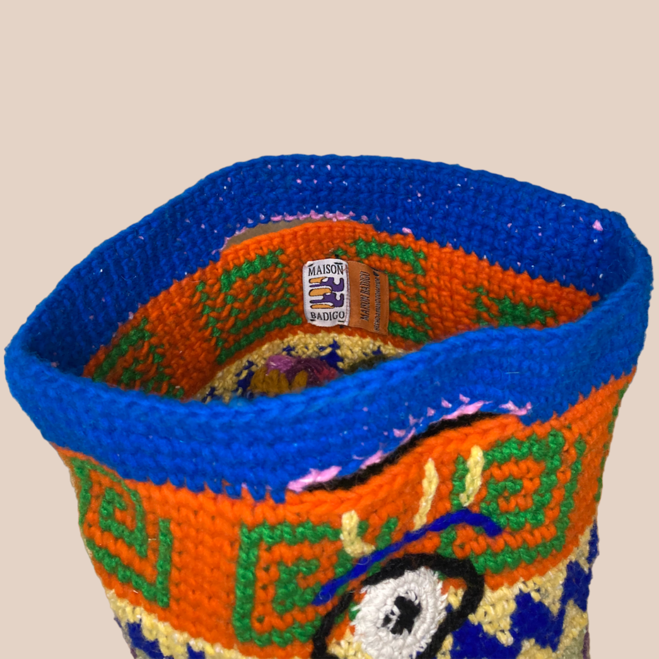  Image du sac motifs oeil de Maison Badigo, sac en laine crocheté multicolore unique et tendance